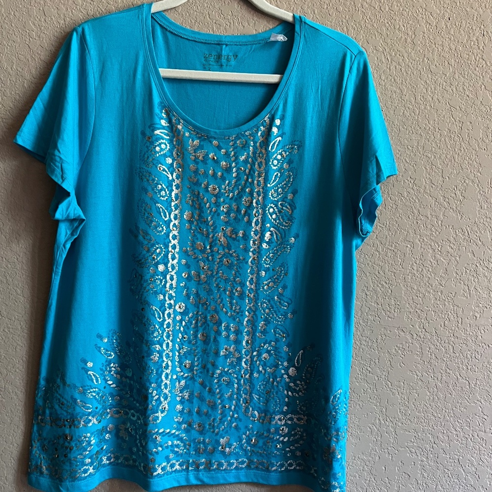Zenergy by Chico’s.  Teal blue with gold paisley design. Size 3.